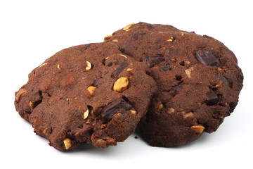 three homemade chocolate cookies with peanuts