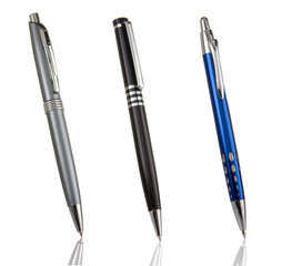black, blue and silver shining pens isolated on white