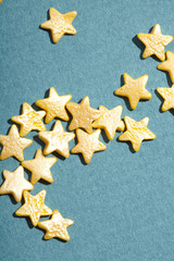 Fototapeta na wymiar gold stars on the blue background