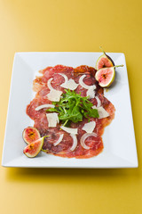carpaccio beef on yellow