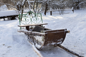 old wooden sled in russian village
