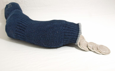 Pièces d'argent dans une chaussette