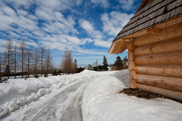traditional polish hut in zakopane during winter season © p a w e l