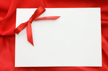 Pure sheet papers on a red fabric