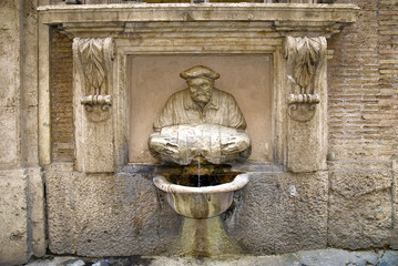 Roma, fontana del facchino a via Lata di Michelangelo Buonarroti - obrazy, fototapety, plakaty