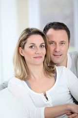 Obraz na płótnie Canvas Portrait of happy couple at home