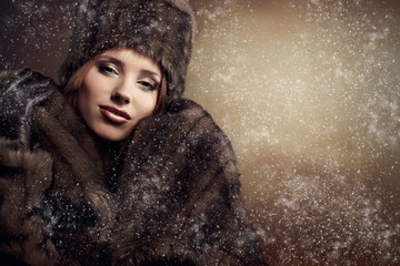 beautiful woman in a fur coat