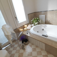 bagno classico con sedia e scarpe