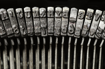 Close-up of typewriter letter and symbol keys