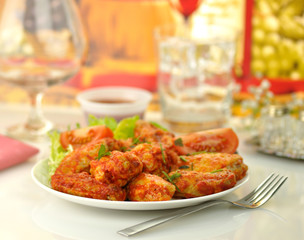 hot chicken wings with salad