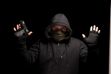 Thief with gun