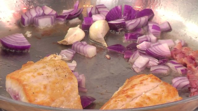 fried fish with bacon and onions