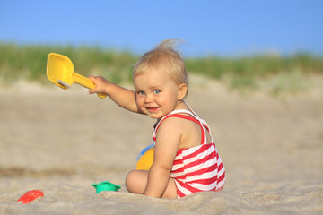 Baby girl on a beach
