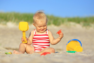 Baby girl on a beach