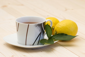 cup of tea and two lemons