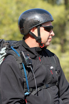 The glider pilot prepares for flight on a paraplane