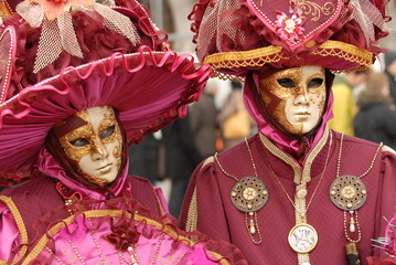 Purple carnival costumes in Venice, Italy.