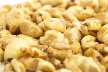 extreme closeup of sweets corn cereals bowl