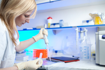 portrait of a female researcher doing research in a lab