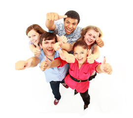 Top view of young friends with hands raised
