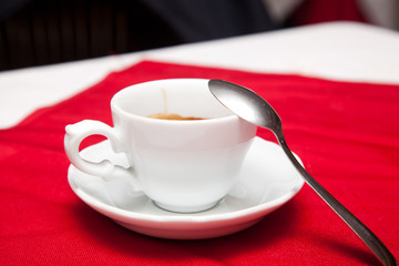 Cup of coffee on the table at the coffee bar
