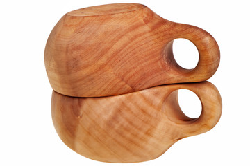 Traditional finnish birch cups isolated over white background.