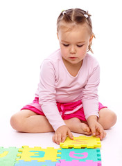 Little girl with alphabet