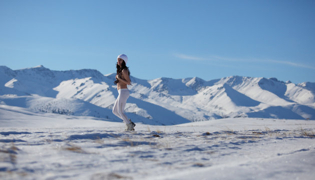 Runner. Woman running outside in beautiful nature.