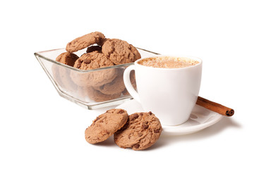 cup of coffee, cinnamon stick and chocolate chip cookies