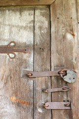 Vintage door with old padlock