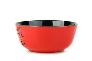 Empty red ceramic bowl
