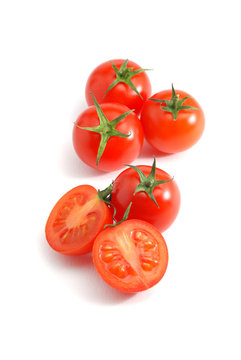 Cherry tomatoes isolated over white