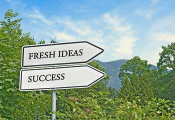 Road sign to fresh ideas and success