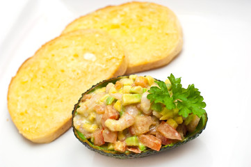 prawn with avocado salad served with garlic bread