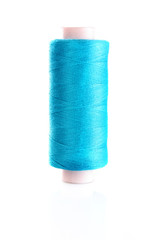 blue bobbin thread isolated on white