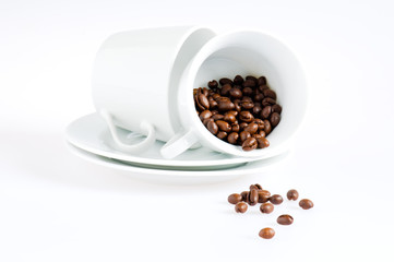 Coffee cups and coffee beans
