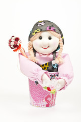 Cloth doll in the bucket