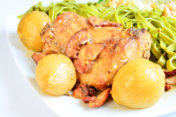 Braised rabbit loin with onion, bacon and mustard