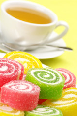 Colorful candy and tea