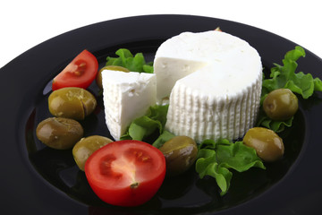 soft feta cheese served with tomato