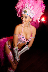 cabaret dancer over dark background