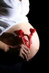 pregnant woman with hearts