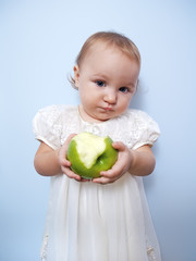 Little girl with an apple