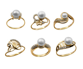 Set of elegant female jewelry golden rings with pearl - 29184661