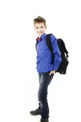 Smiling schoolboy. Isolated over white background