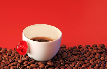a cup of coffee and coffee beans