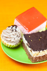 cake at the plate lying on an orange cloth