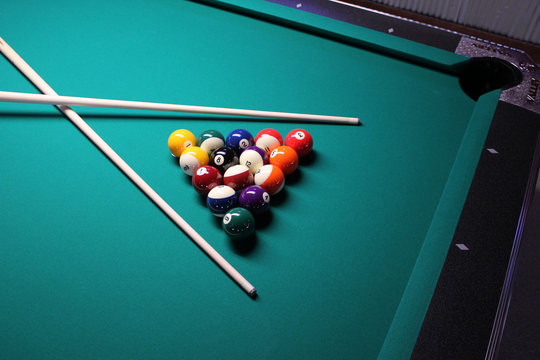 Pool Table - A game of 8 Ball, racked and ready to go!
