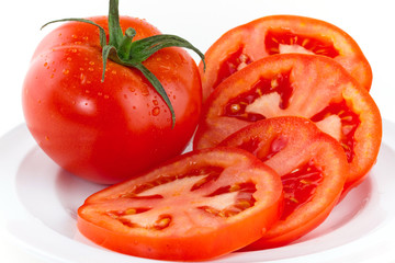 Fresh red tomatoes isolated on white