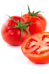 Fresh red tomatoes isolated on white